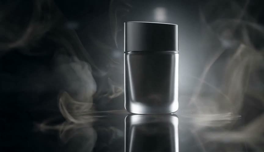 Cinematic slow push-in on a luxury matte perfume bottle as soft smoke drifts past, dramatic rim light, shallow depth of field, 16:9 — sample output